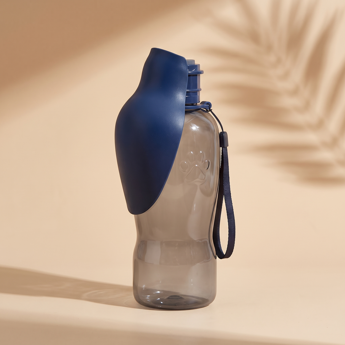Furlet Travel Water Bottle in Blue with the scoop lid folded closed